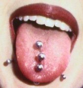 Woman tounge piercing